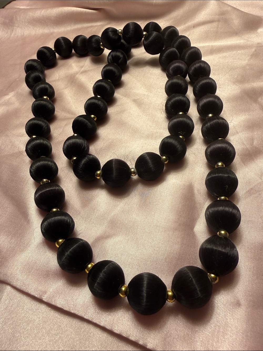 Elegant Black Satin Bead Necklace with Gold Accents